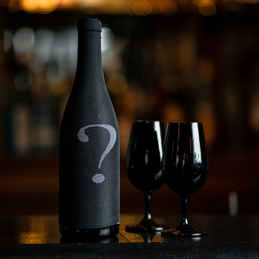 Mysterious wine bottle for a blind date at the Dans le Noir ? restaurant
