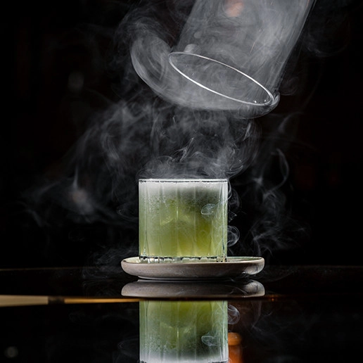 Smoking green cocktail at the Dans le Noir ? restaurant