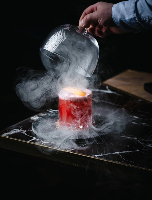 Smoky pink cocktail served at the Dans le Noir ? restaurant