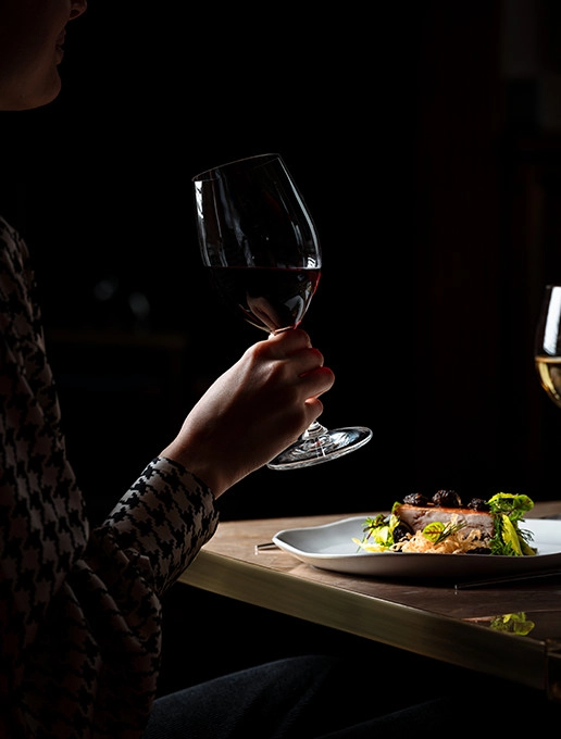 A wine and food pairing tasting during a special Mother’s Day dinner at the Dans le Noir ? restaurant