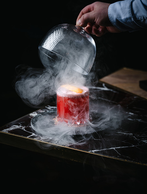 Smoky pink cocktail served at the Dans le Noir ? restaurant
