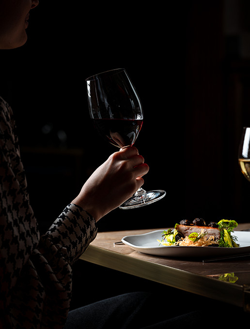A wine and food pairing tasting during a special Mother’s Day dinner at the Dans le Noir ? restaurant